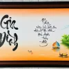 Tranh thư pháp chữ Gia Đình 55x100cm trên canvas cao cấp kết hợp phong cảnh đồng quê Việt Nam.
